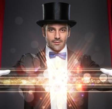 a magician with a magic wandet and a hat