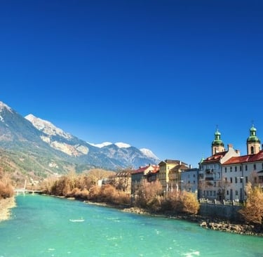 a river with a mountain in the background