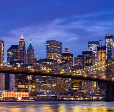 a bridge spanning the new york city's skyline