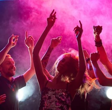 a group of people dancing at a party