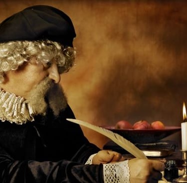 A man in a Renaissance costume writing with a quill pen by candlelight.