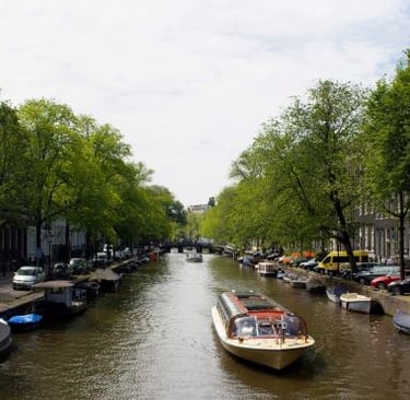 tour boat - a boat on a river with a boat in the water