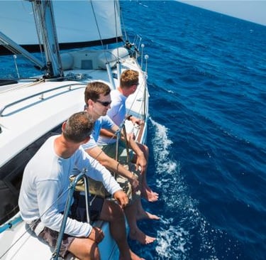 a group of people sitting on a boat