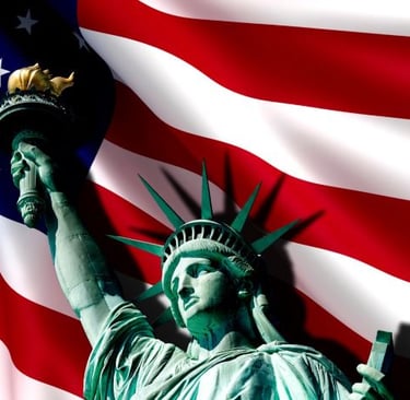 a statue of liberty in front of a flag