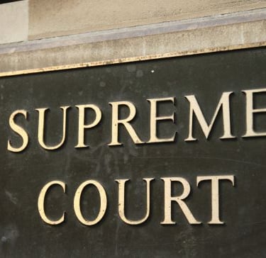 a sign that says supreme court court