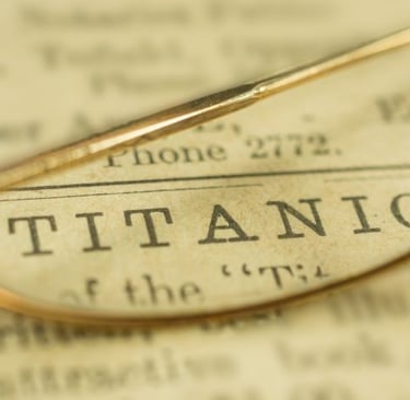 newspaper with the word “Titanic” on it