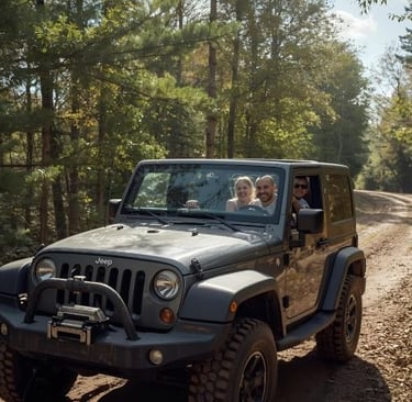 a man driving a jeep with two children