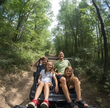 a family of four people riding in a jeep