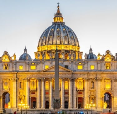 a large building with a dome shaped building in the background