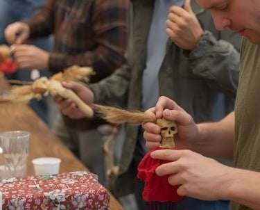 people making a voodoo doll