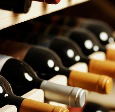 a wine rack with bottles of wine and bottles of wine