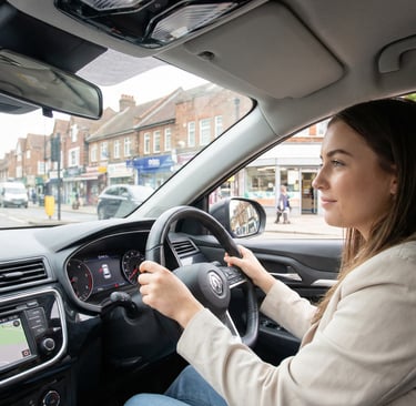 Learner driver taking automatic driving lessons in Chingford with an instructor beside them