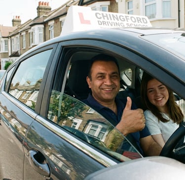 Driving instructor in Chingford giving a thumbs up to a student after a successful lesson.