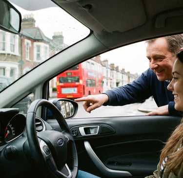 Professional driving instructor giving advice to a learner driver during a lesson in Chingford.