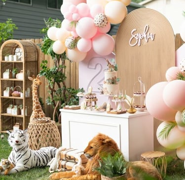 Fun balloon animal party favors, perfect for entertaining guests at a 1st birthday celebration.