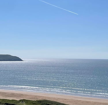 Woolacombe Beach, the sun sparkling on the sea