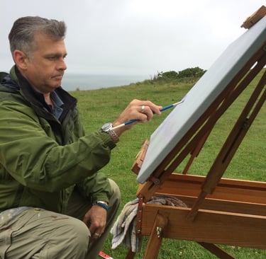 Chris Gill painting outdoors