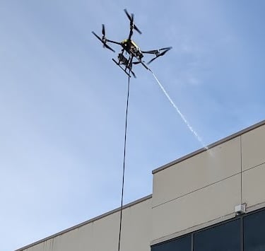 building facade drone pressure washing services