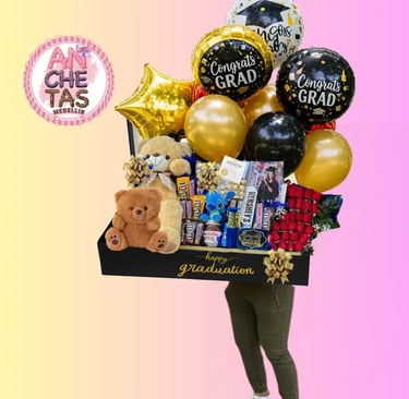 a woman holding a box of balloons and balloons