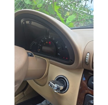 Car key in ignition of a 2003 Mercedes - car locksmith service