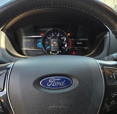 Key on speedometer of a 2023 Ford representing Asheville Locksmith Now all keys lost service