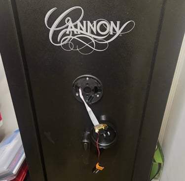 Cannon gun safe with detached electronic keypad and exposed wiring during a locksmith safe repair in Weaverville, NC