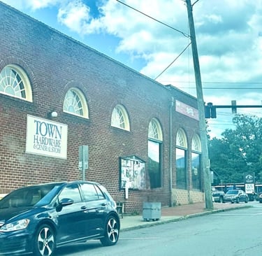 Black Jetta parked beside Town Hardware and General Store in Downtown Black Mountain