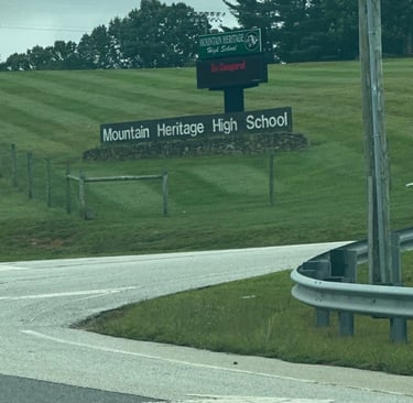 Mountain Heritage High School sign in Burnsville, North Carolina representing commercial locksmith service 