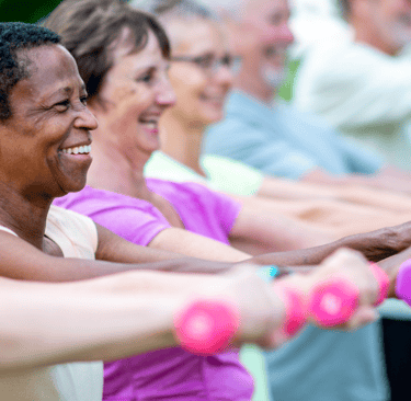 a group of people holding dumb dumbs and dumbs