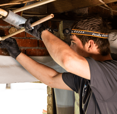 Caleb Smith rerouting PVC Pipe