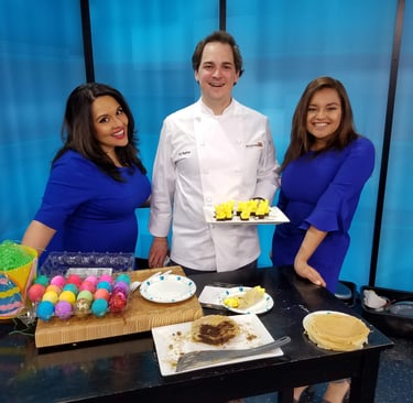 Chef Andrew cooking on a morning TV show.