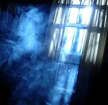 a person standing in front of a window with a window