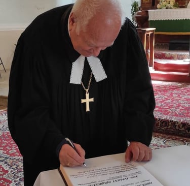 Signing his membership documents