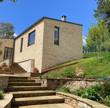 Cotswold stone-faced extension built using long-lasting traditional techniques
