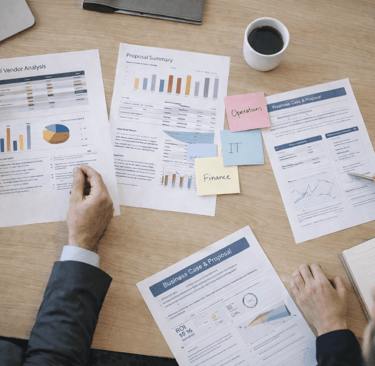 Buying committee reviewing proposal documents.