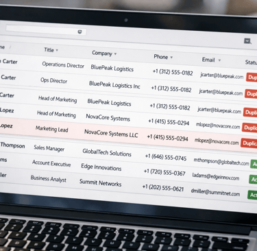 CRM dashboard showing duplicate contact entries flagged with warnings