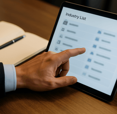 Hand selecting an industry on a tablet.
