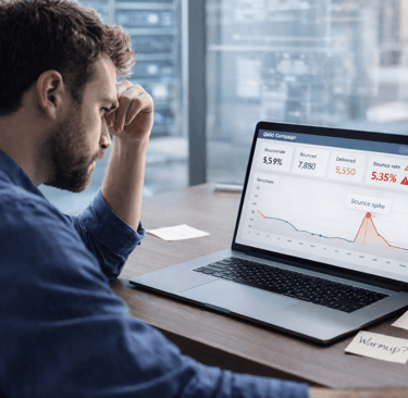 Founder reviewing rising bounce rates on a cold email campaign dashboard