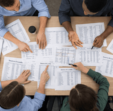 SDR team reviewing conflicting lead data from multiple sources