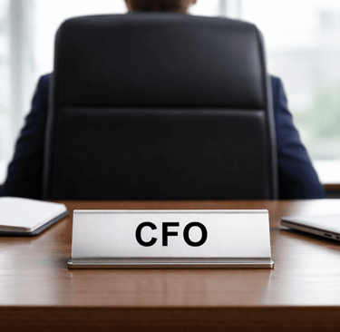 Office desk with CFO nameplate showing role accuracy