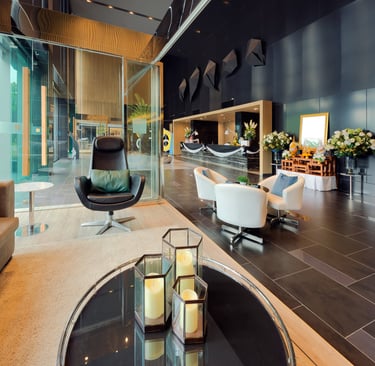 Hotel lobby with art and lounge seating — Disney adventures and late-night mischief