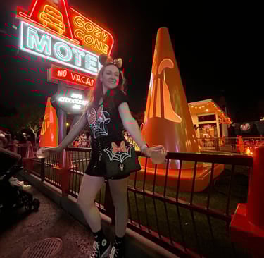 DisneyBounding look in front of the Cozy Cone Motel — Playful late-night Disney style for adults