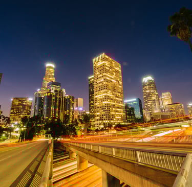 Nighttime cityscape of downtown Los Angeles — A vibrant getaway just a short drive from Disneyland