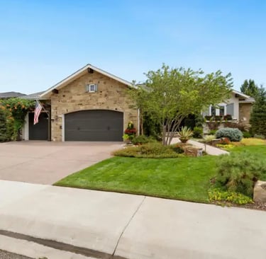 a house with a concrete driveway 