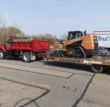 moving tracked skid steer 