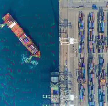 calculator and shipping documents showing total landed cost calculation for preserved flowers import