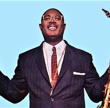 Photograph of musician Earl Bostic holding a saxaphone