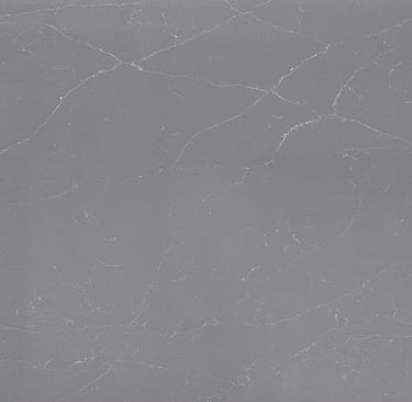 plancha, superficie o cubierta de cuarzo gris con delicadas vetas blancas 