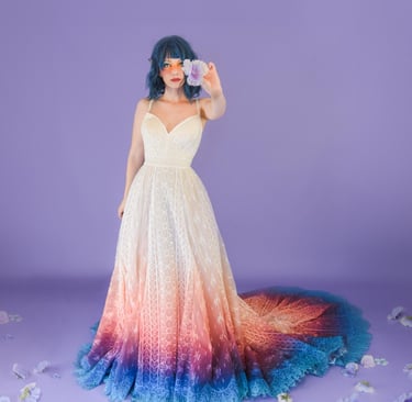 Woman in Boho wedding dress with a sunset ombre dip dye.