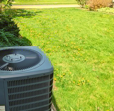 AC installed at a home in Richfield helps to cut the household humidity in the summer heat.